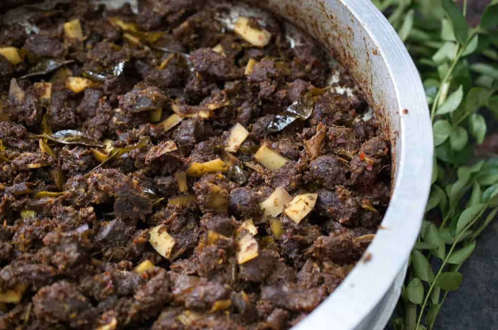 Beef cooked with spices and then stir-fried with coconut slices and curry leaves. This Kerala style beef fry / Beef Ularthiyathu is an easy and delicious appetizer or a great side-dish with rice. Beef Varattiyathu is one of the favorite dishes of Malayalees. An excellent touching for alcohol too