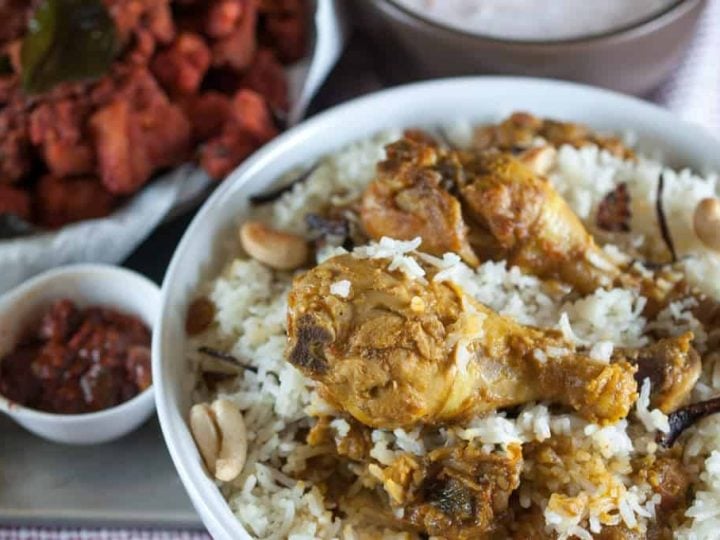 Chicken marinated and cooked with spices and layered with rice. Nadan chicken biriyani is one of my favorites. An easy, tasty and delicious Kerala style chicken biriyani recipe.An Indian one pot meal. This recipe is originated from Malabar region of Kerala.