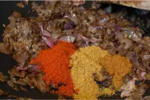 Sautéed onions mixed with red chilli powder, coriander, and garam masala for konchu roast.