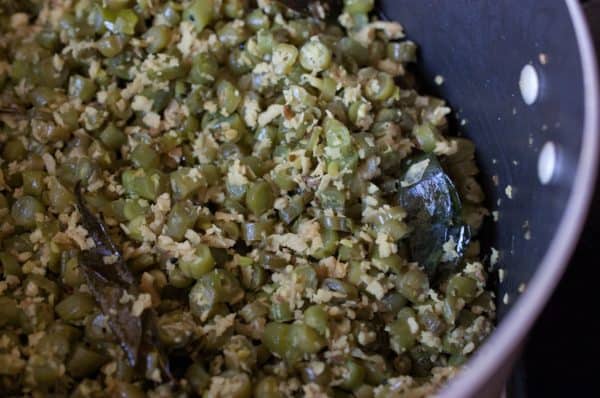 Chopped green beans were added to the coconut mixture in the pan.