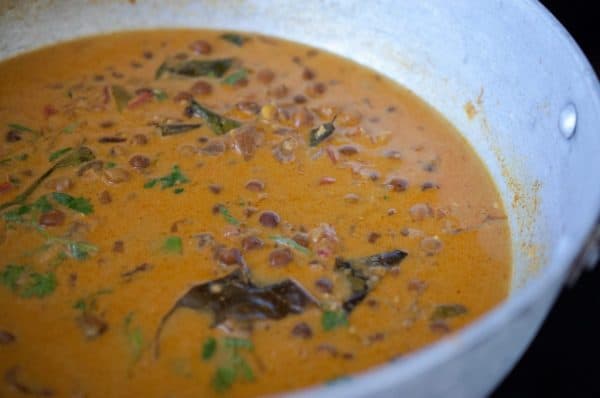 Tempered Curry with mustard seeds, curry leaves, shallots, and dried red chilies sautéed in coconut oil.