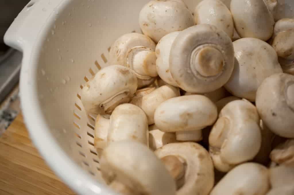 Mushrooms cooked and sauteed in ginger garlic, pepper, and spices