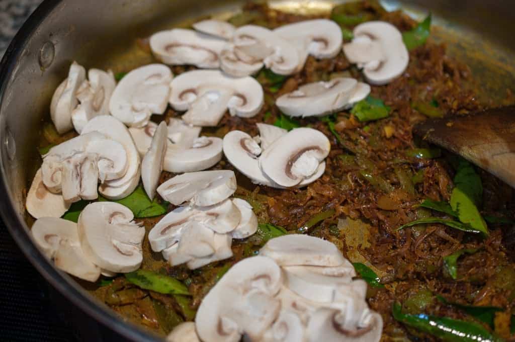 Mushrooms cooked and sauteed in ginger garlic, pepper, and spices