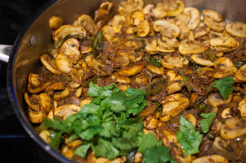 Mushrooms cooked and sauteed in ginger garlic, pepper, and spices