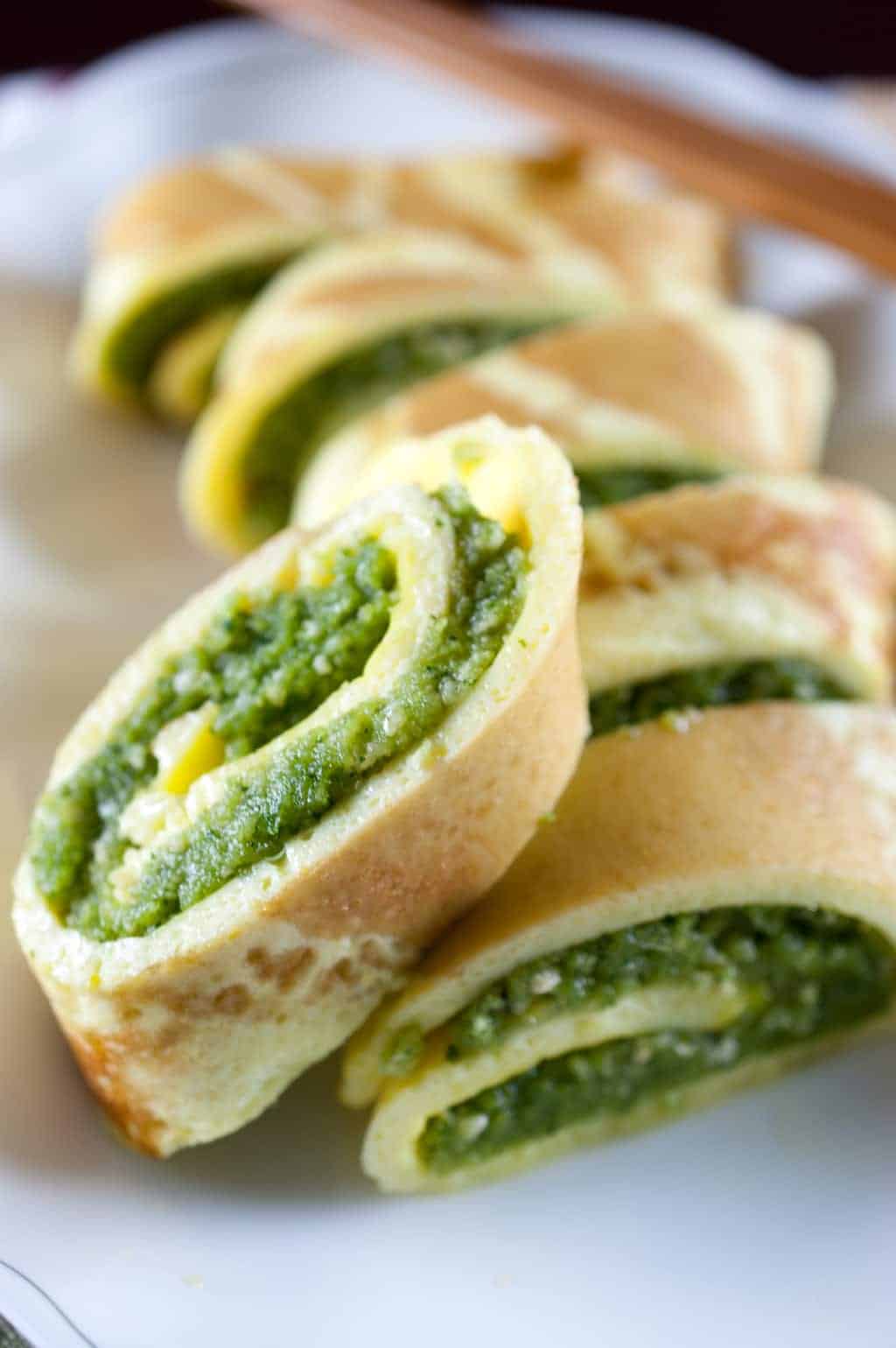 These Omelette roll stuffed with cashew cilantro paste are amazing and taste so delicious. Cashew, coriander/cilantro, and coconut paste stuffing makes it the best. An easy snack that you can whip up and serve guest quickly. You just need all the ingredients in hand. 