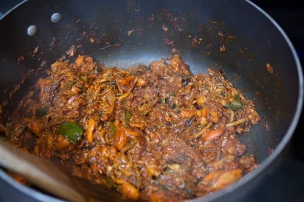 Final stage of Kerala Style mussels fry with thick roasted masala and curry leaves.