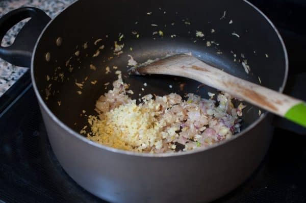 Crushed ginger and garlic added to sautéed onion while making base masala.