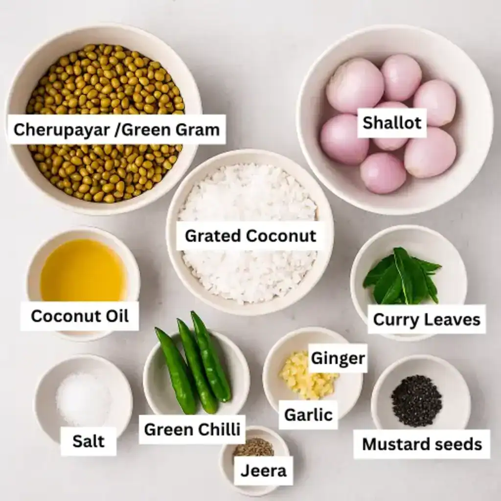 Ingredients for Cherupayar Thoran in bowls, showing green gram, coconut, shallots, green chili, curry leaves, spices, and jeera.