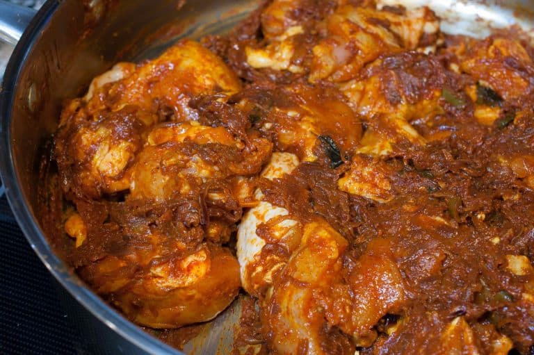 Chicken curry with semi thick gravy well flavored with spices and coconut milk. It goes well with pathiri, any sort of rice variants ( ghee rice, pulao, normal rice), chapati, parotta/paratha, appam or any other Indian breads.