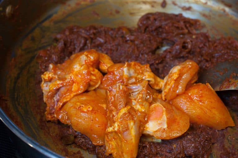 Chicken curry with semi thick gravy well flavored with spices and coconut milk. It goes well with pathiri, any sort of rice variants ( ghee rice, pulao, normal rice), chapati, parotta/paratha, appam or any other Indian breads.