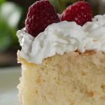 Tres Leches cake, otherwise called as Three Milk Cake. Sweet and moist two layer cake with vanilla sponge cake base completely soaked in three kinds of milk, topped with whipped cream.