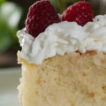 Tres Leches cake, otherwise called as Three Milk Cake. Sweet and moist two layer cake with vanilla sponge cake base completely soaked in three kinds of milk, topped with whipped cream.