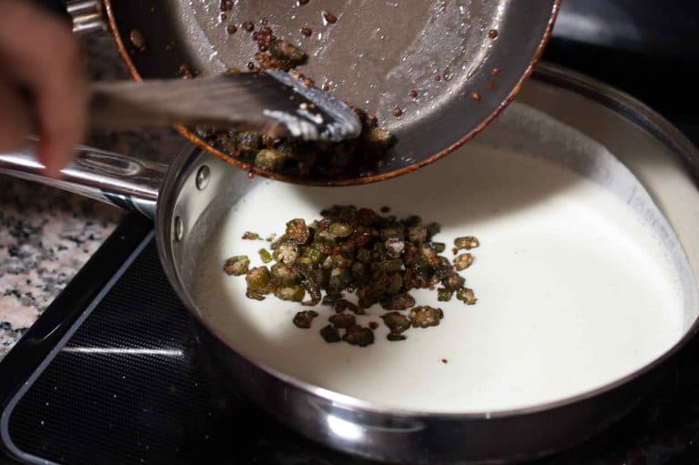 Ladies finger/Okra/Bhindi fried and cooked in spicy coconut and yogurt based gravy. It’s an easy to prepare and a yummy side dish which goes well with rice