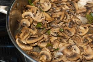 Mushroom cooked in spicy coconut gravy. An improvised version of Kerala theeyal preparation with mushrooms. This quick, delicious curry goes well with rice, chapati, and any Indian breads.