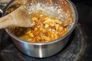 Crunchy cashew nut sprinkle. Cashew nuts toasted, mixed in caramel and then crumbled. Caramelized Cashew nut is great as topping on desserts or along with granola for breakfast.