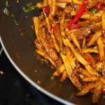 Honey Chilli Potato is a popular Indo-Chinese appetizer. Crispy Fried Potatoes cooked with spring onion and bell peppers in a sweet and spicy sauce.
