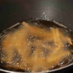 Honey Chilli Potato is a popular Indo-Chinese appetizer. Crispy Fried Potatoes cooked with spring onion and bell peppers in a sweet and spicy sauce.