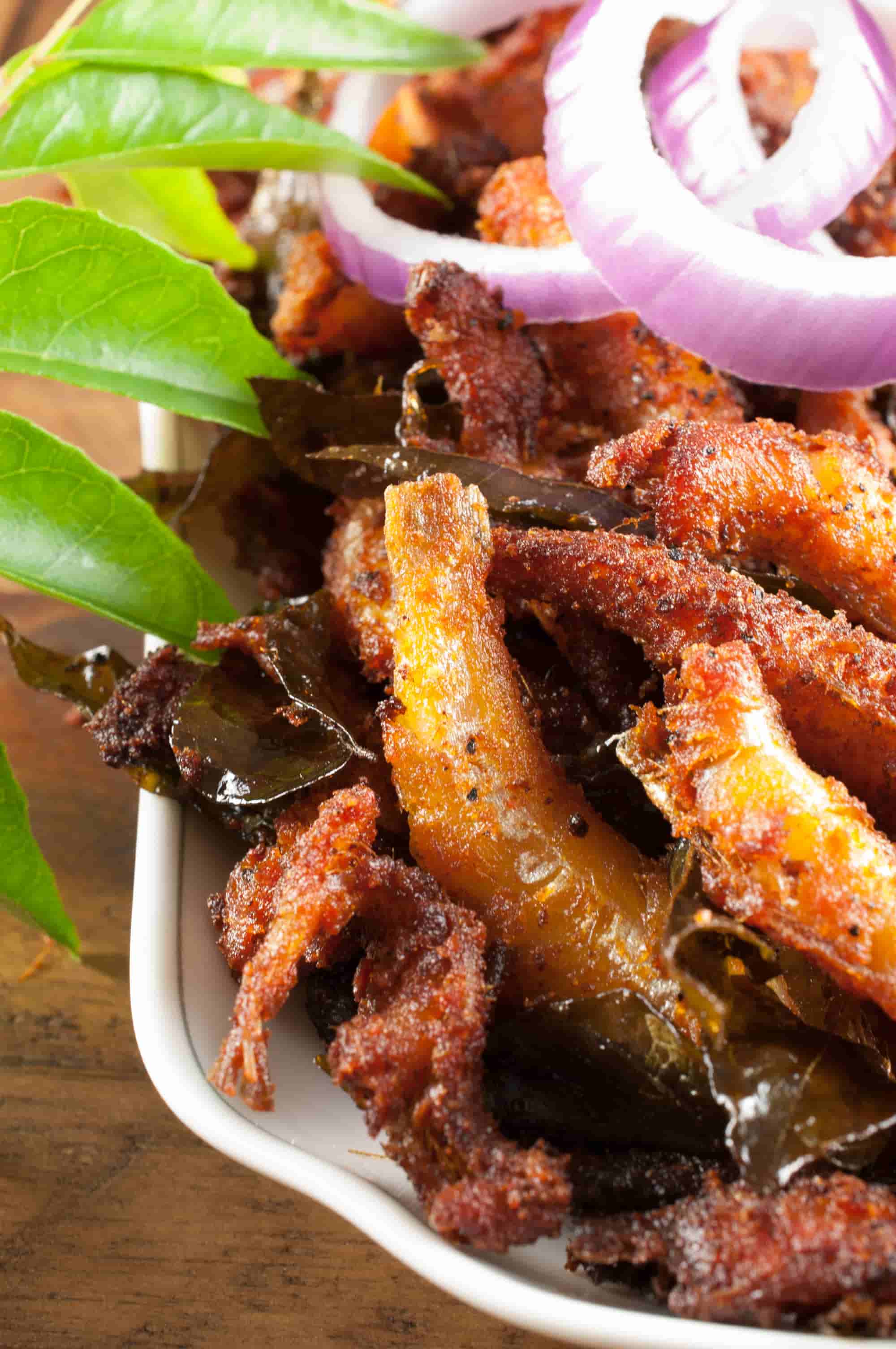 Crispy and spicy Anchovy or Kozhuva or Netholi fry. Anchovies marinated with spices and then shallow fried. A quite easy and tasty appetizer.