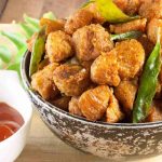 Soya chunks deep fried with the ginger-garlic, chilly and curry leaves. This soya chunks masala fry is a quick, tasty and healthy appetizer that can be done in no time.