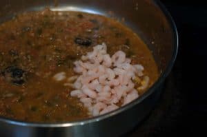 A spicy dish, made with roasted coconut and spices, flavored with cocum. A simple and quick Kerala style prawns/shrimp curry preparation