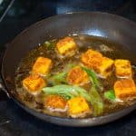 Indian cottage cheese / Paneer shallow fried with ginger-garlic, spices, and curry leaves. This paneer fry is an easy and yummy appetizer for any occasions.