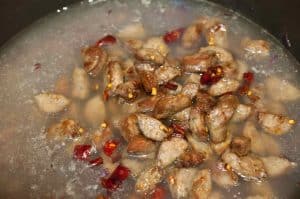 Spicy Italian sausage, fresh leaves, and potatoes in a creamy broth topped with crumbled bacon. An easy and yummy Copycat Olive Garden Zuppa Toscana Soup recipe.