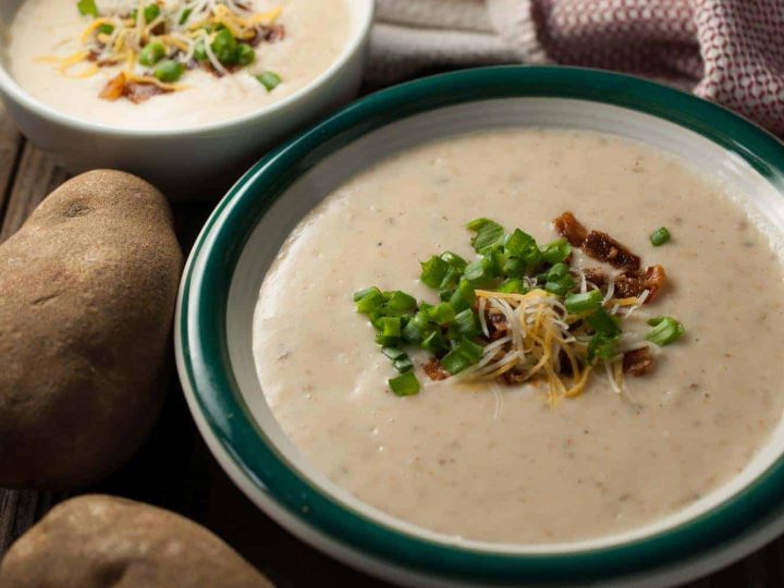 Potatoes pressure cooked, blended with cream cheese and topped with green onions, cheese, and bacon. This Instant Pot Easy Creamy Potato Soup is a healthy One Pot Soup and one of my favorites for dinner, especially during winter time.