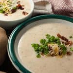 Potatoes pressure cooked, blended with cream cheese and topped with green onions, cheese, and bacon. This Instant Pot Easy Creamy Potato Soup is a healthy One Pot Soup and one of my favorites for dinner, especially during winter time.