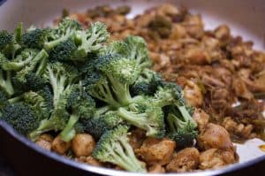 Chicken and broccoli cooked and sauteed in ginger garlic, pepper, and spices. This Indian Healthy Chicken and Broccoli Stir Fry is a healthy and tasty side-dish with rice, roti, and any Indian bread. An easy recipe which you can make for a weekday dinner.
