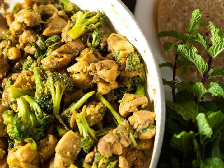 Chicken and broccoli cooked and sauteed in ginger garlic, pepper, and spices. This Indian Healthy Chicken and Broccoli Stir Fry is a healthy and tasty side-dish with rice, roti, and any Indian bread. An easy recipe which you can make for a weekday dinner.
