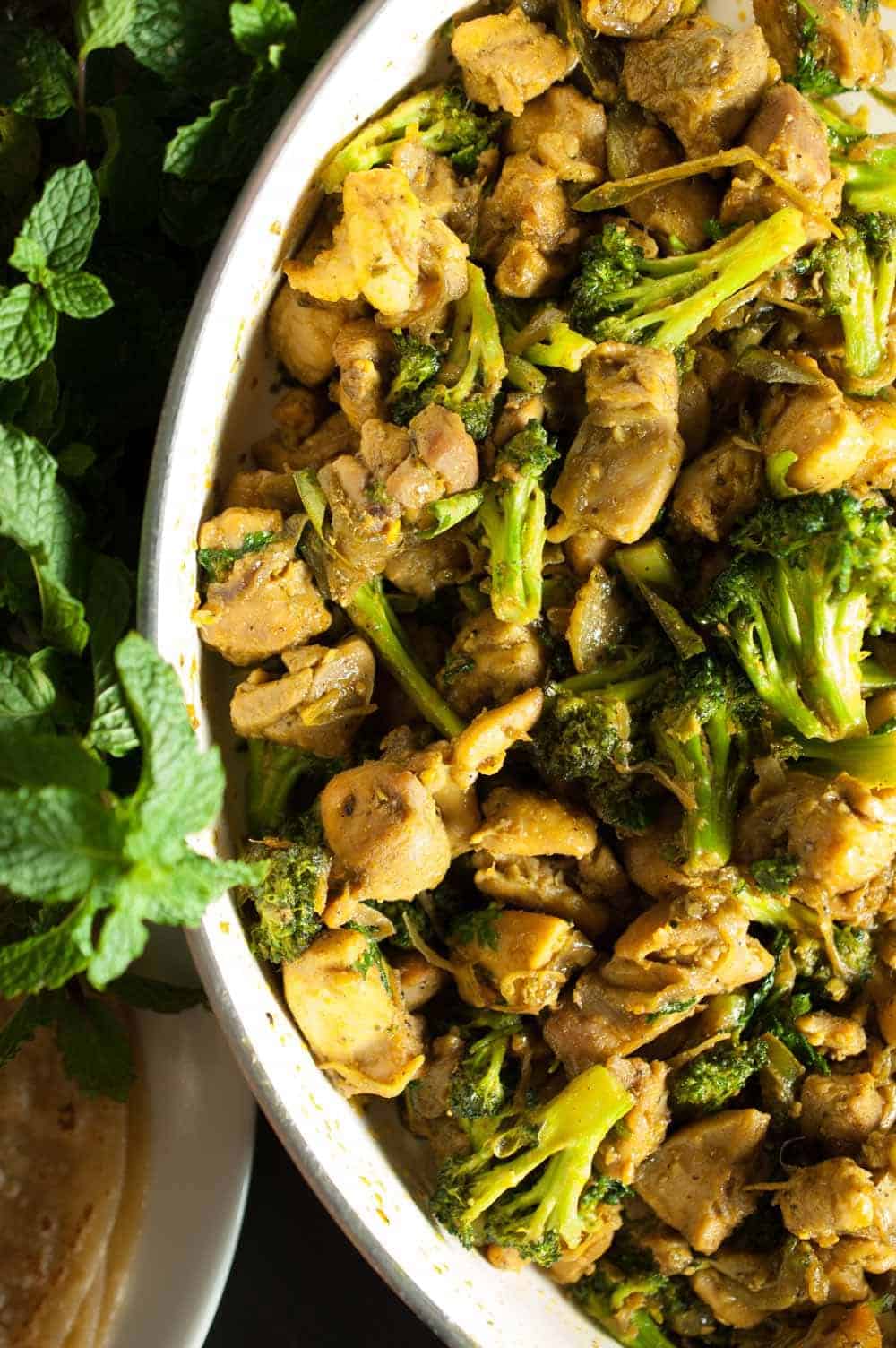 Chicken and broccoli cooked and sauteed in ginger garlic, pepper, and spices. This Indian Healthy Chicken and Broccoli Stir Fry is an easy and tasty side-dish with rice, roti, and any Indian bread. A quick recipe which you can make for a weekday dinner.