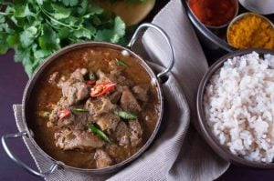 An easy peasy Instant Pot Indian beef curry recipe, well flavored with spices. An authentic Kerala style beef curry pressure cooked in an Instant Pot. It goes well with chapati, parotta/paratha, pathiri (rice bread), any rice variants ( pulao, ghee rice, regular rice), appam (rice pancake) or any other Indian breads. This curry works out well for Paleo/Gluten-free/Keto lifestyle.