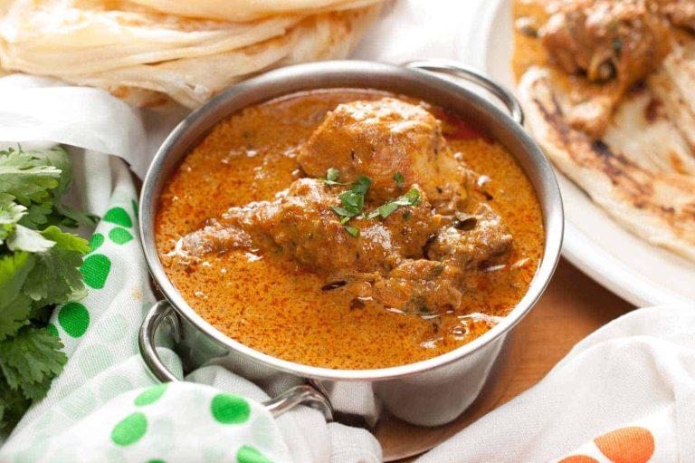 Chicken curry well flavored with spices and coconut milk. An easy and delicious Instant Pot Indian chicken curry recipe that you can quickly make even on a weekday. It goes well with chapati, paratha, any rice variants ( pulao, ghee rice, regular rice), appam (rice pancake) or any other Indian breads.