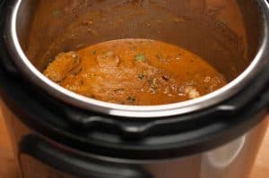 Chicken curry well flavored with spices and coconut milk. An easy and delicious Instant Pot Indian chicken curry recipe that you can quickly make even on a weekday. It goes well with chapati, paratha, any rice variants ( pulao, ghee rice, regular rice), appam (rice pancake) or any other Indian breads.