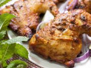 Chicken marinated in yogurt and spices and then baked in an oven. This Indian Tandoori Chicken In Oven recipe is straightforward to make at home with minimal ingredients