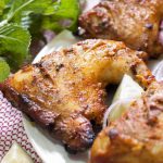 Chicken marinated in yogurt and spices and then baked in an oven. This Indian Tandoori Chicken In Oven recipe is straightforward to make at home with minimal ingredients