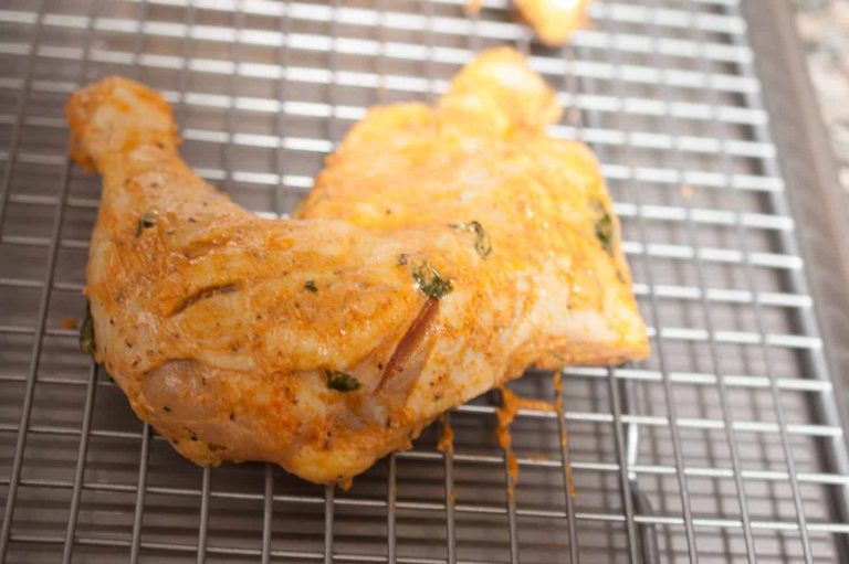 Chicken marinated in yogurt and spices and then baked in an oven. This Indian Tandoori Chicken In Oven recipe is straightforward to make at home with minimal ingredients
