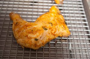 Chicken marinated in yogurt and spices and then baked in an oven. This Indian Tandoori Chicken In Oven recipe is straightforward to make at home with minimal ingredients