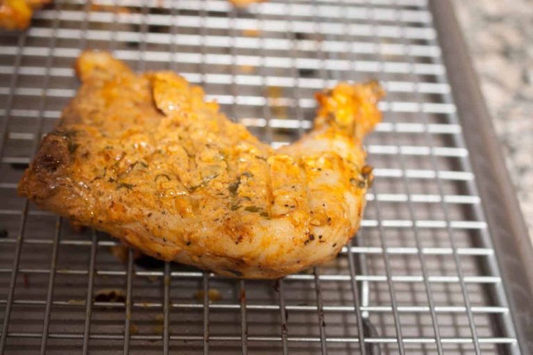 Chicken marinated in yogurt and spices and then baked in an oven. This Indian Tandoori Chicken In Oven recipe is straightforward to make at home with minimal ingredients