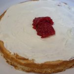 Moist and rich white chocolate cake with white chocolate cream cheese and raspberry filling, and frosted with white chocolate ganache. The white chocolate cake is our family favorite cake recipe, and I went with the same flavor for my daughter Eva's first birthday cake.