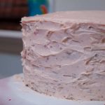 Moist and rich white chocolate cake with white chocolate cream cheese and raspberry filling, and frosted with white chocolate ganache. The white chocolate cake is our family favorite cake recipe, and I went with the same flavor for my daughter Eva's first birthday cake.