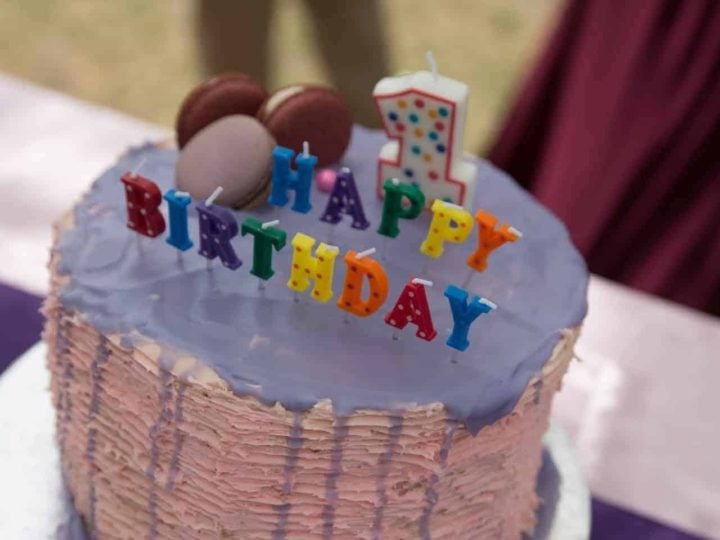 Moist and rich white chocolate cake with white chocolate cream cheese and raspberry filling, and frosted with white chocolate ganache. The white chocolate cake is our family favorite cake recipe, and I went with the same flavor for my daughter Eva's first birthday cake.