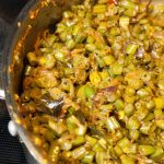 Kerala style beans stir fry with spices, ginger, and garlic. This Beans Mezhukkupuratti or Beans Olathiyathu is a quick and healthy side dish that goes well with rice.
