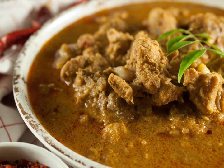 Chicken curry well flavored with roasted coconut and spices. This recipe is a Malabari delicacy. It goes well with pathiri, kerala porotta, any sort of rice variants (ghee rice, pulao, normal rice), chapathi, appam or any other Indian breads.