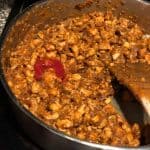 This is an image of tomato ketchup added to sauteed masala