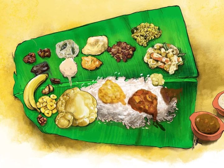 Onam sadya served on banana leaf. Matta rice with avial, sambhar, pachadi, kichadi, olan, kaalan and chips