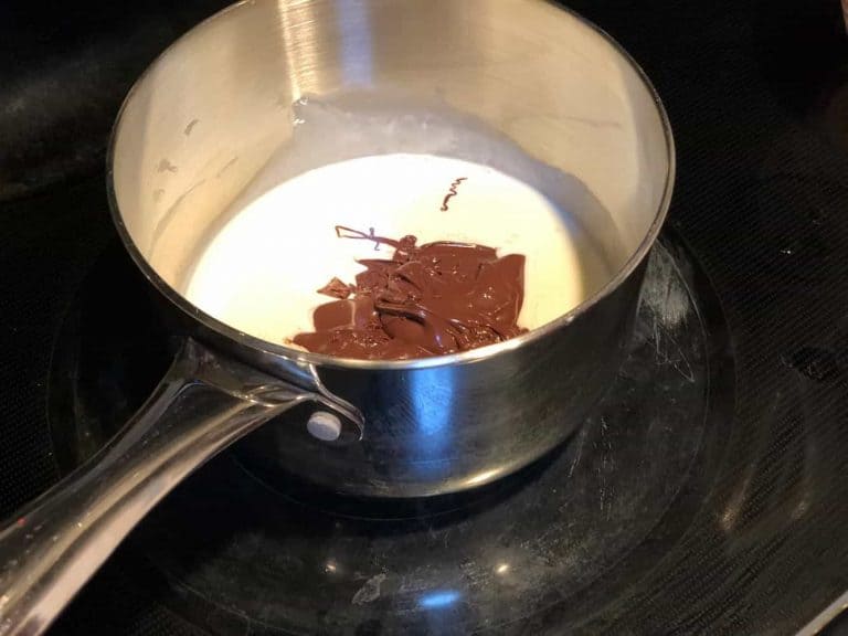 To make chocolate coffee ganache, In another saucepan, bring cream just to a boil and mix with melted chocolate