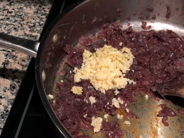 While making the masala for puff pastry, saute onion, curry leaves and salt until onion turns lightly brown. Then, add ginger and garlic.