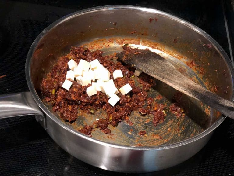 While making the masala for puff pastry, once onion and the masalas are sauteed, add chopped paneer pieces