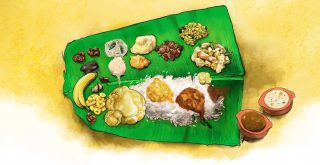 Onam sadya served on banana leaf. Matta rice with avial, sambhar, pachadi, kichadi, olan, kaalan and chips